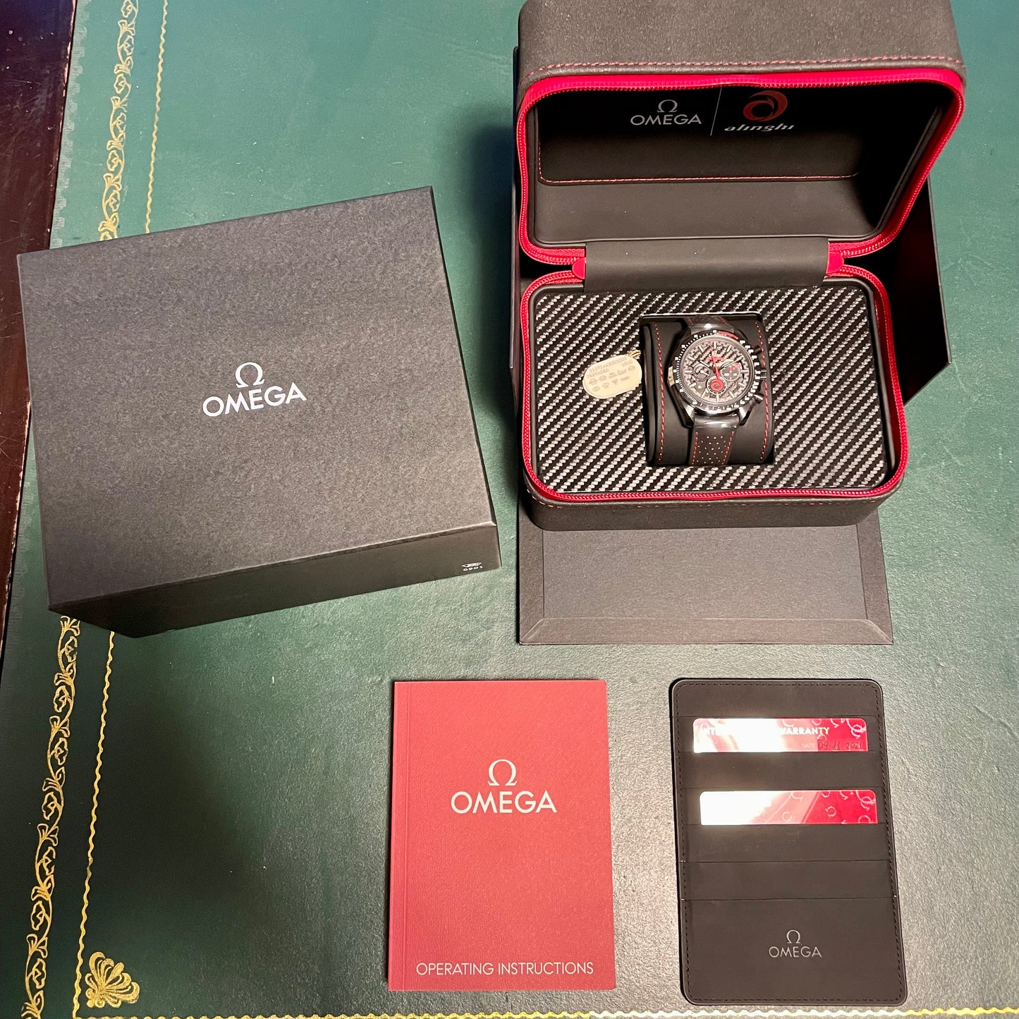 Omega Speedmaster „Dark Side of the Moon Team Alinghi“ - 311.92.44.30.01.002